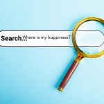 Where do unhappy people search for happiness?